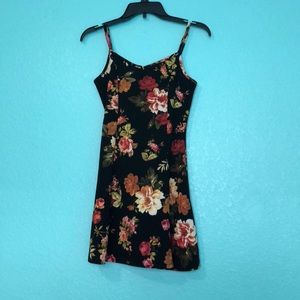 Floral black dress with spaghetti straps.